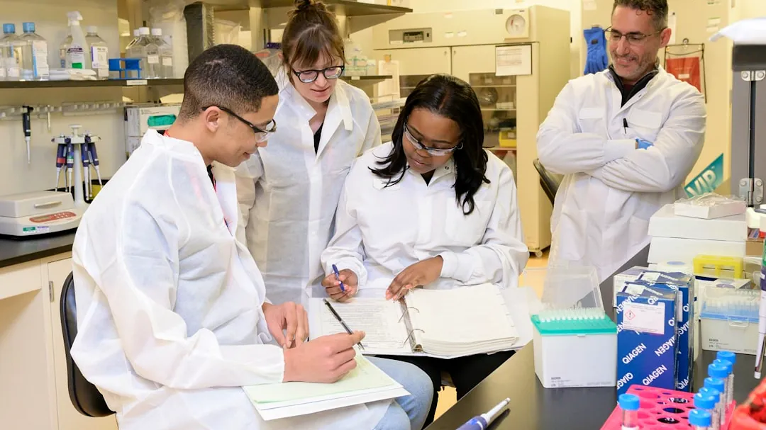 a group of people working in a lab