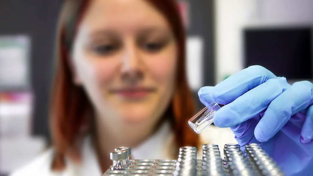 a woman in a lab coat
