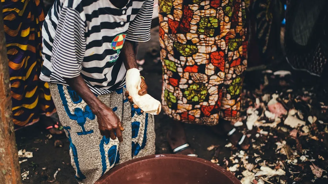 person white cloth near pail