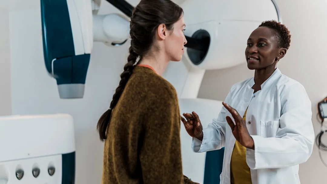 a doctor talking to a patient